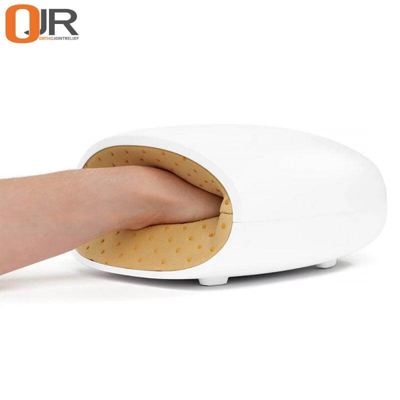 Air compression hand massager with soothing heat therapy showing product in use